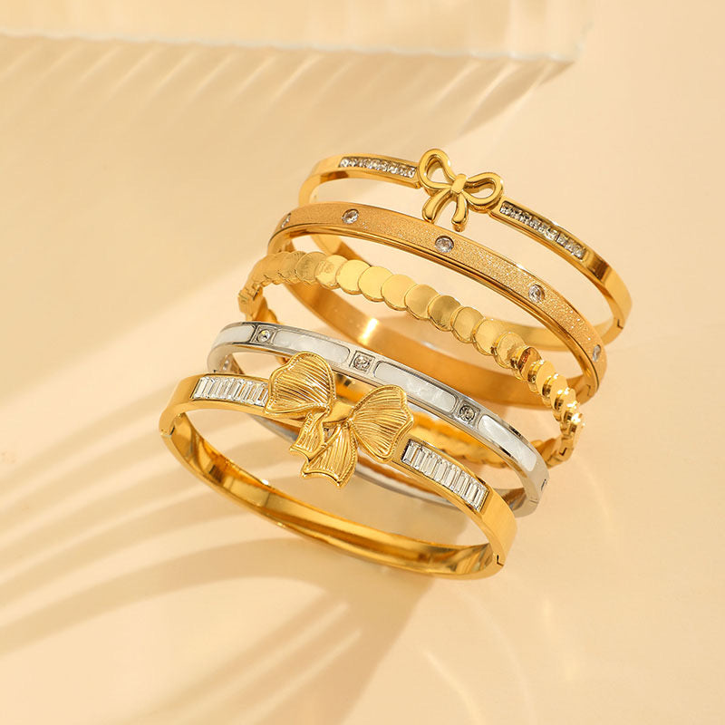 Stainless steel elegant bangles gold bow